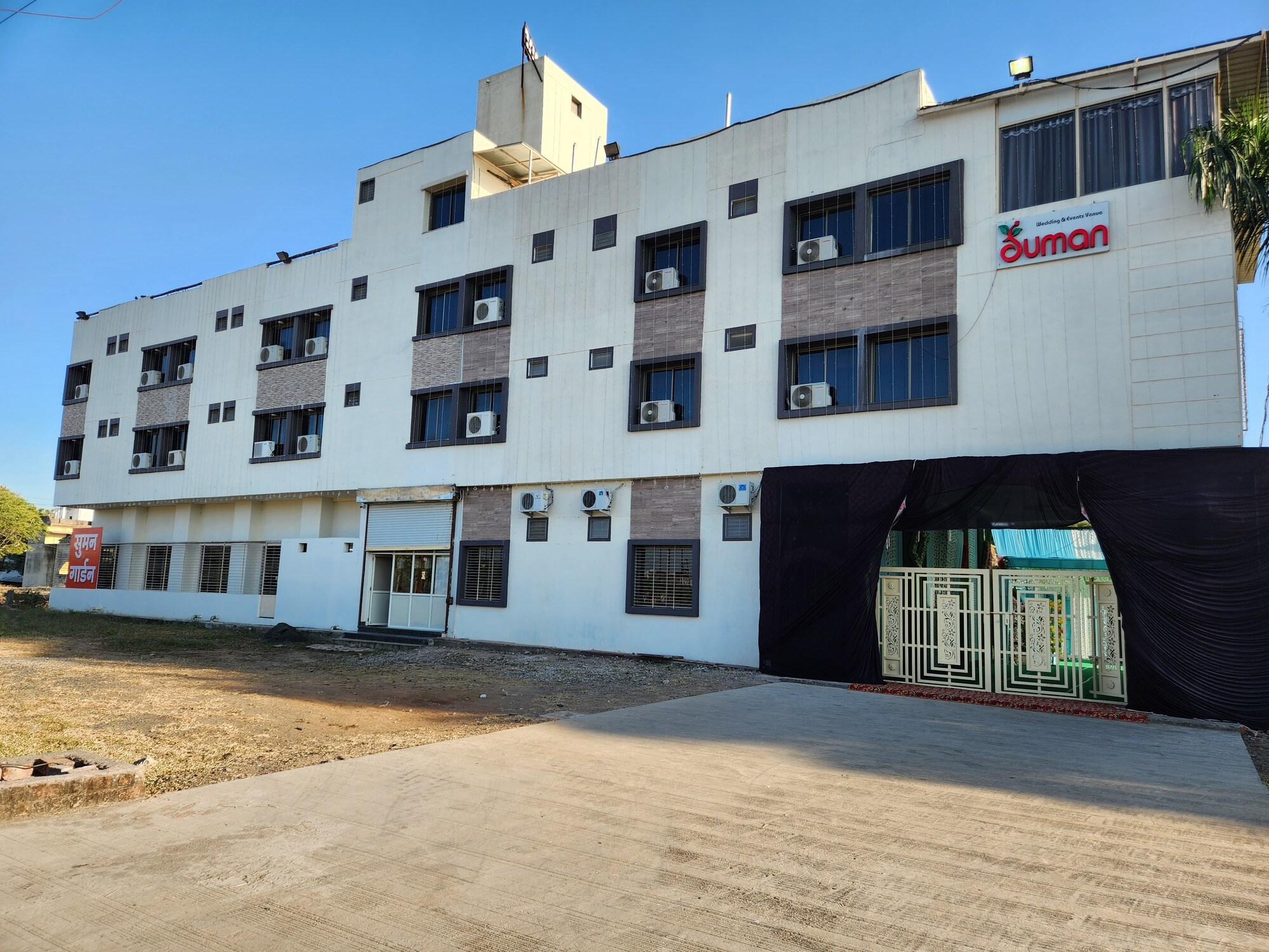 Decorated wedding entrance gate at Suman Venue